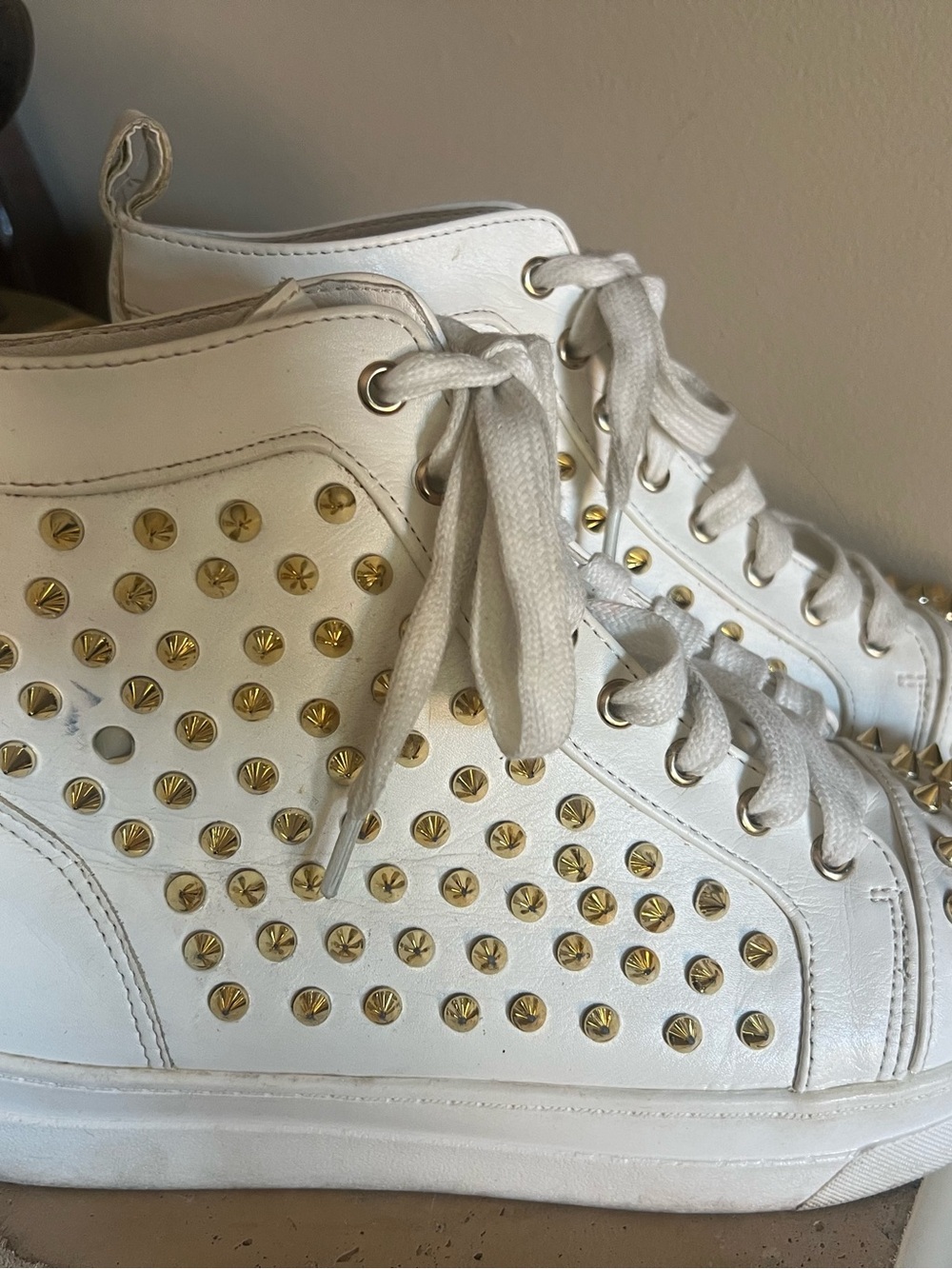 White High-Top Sneakers with Gold Stud Accents